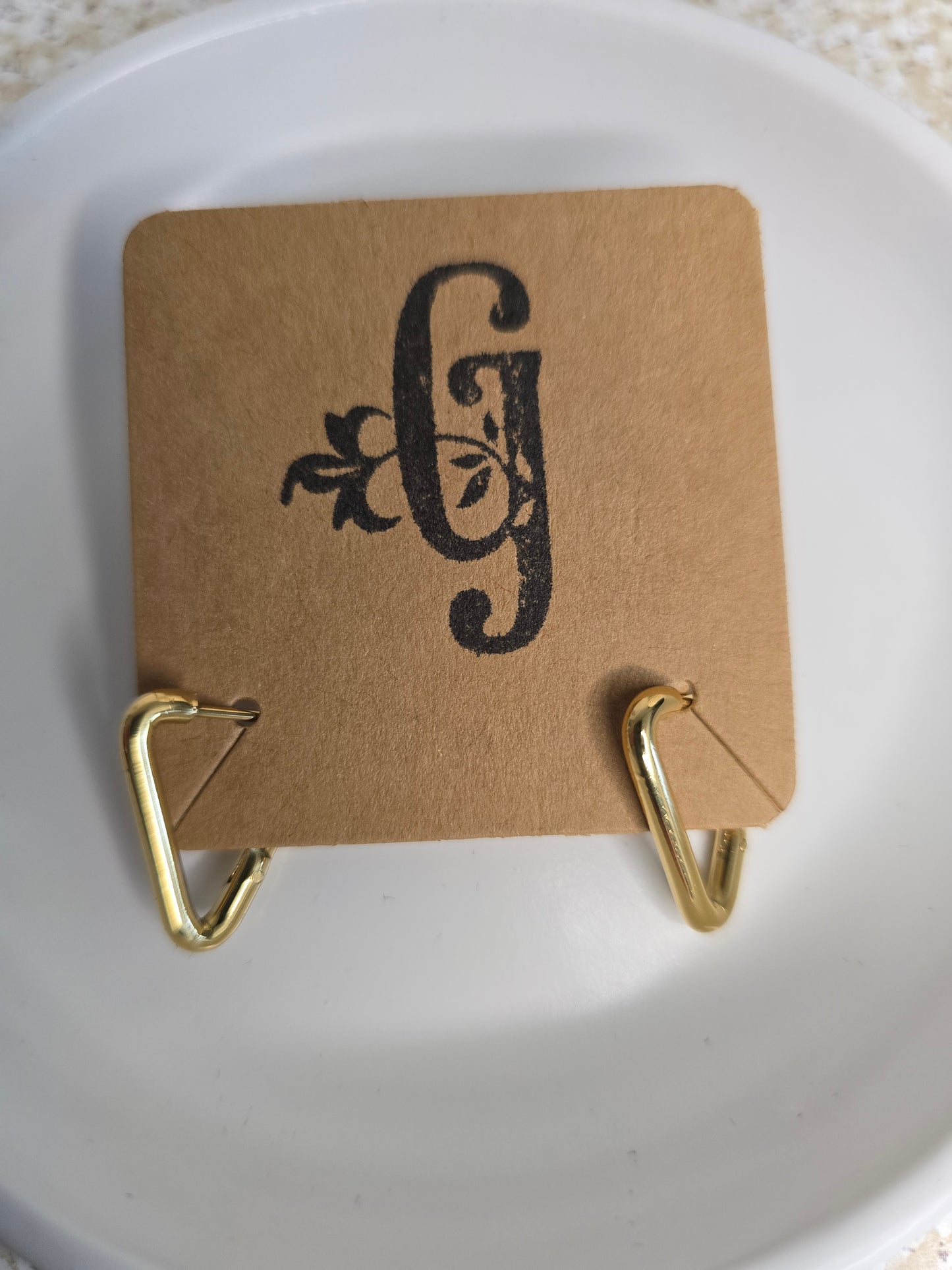 Progress And Change Triangle Huggie Earrings