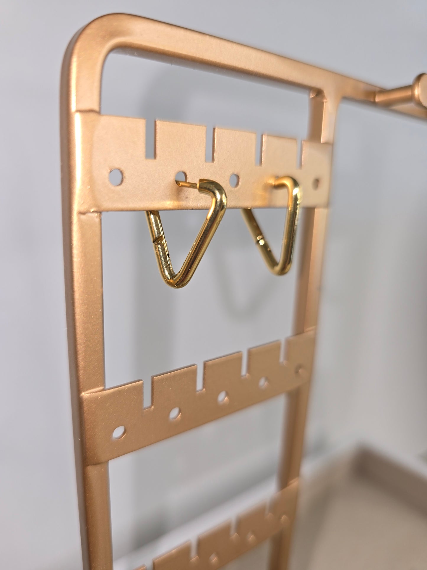 Progress And Change Triangle Huggie Earrings