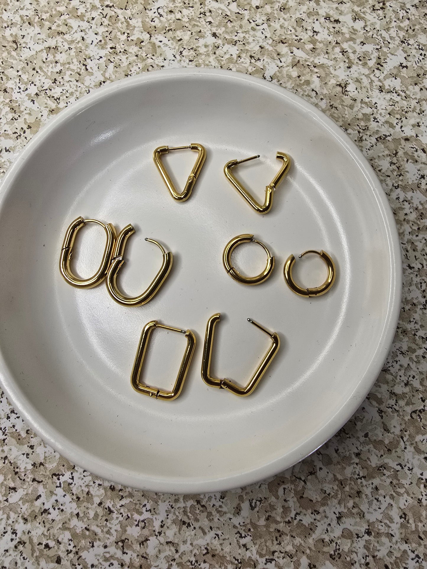 Progress And Change Triangle Huggie Earrings